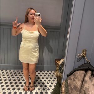 Elegant butter yellow/cream color satin bodycon dress with straps & back bow tie